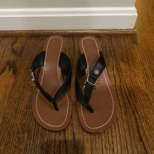 Tory Burch size 9 platform flip flops. Platform is brown with black thongs